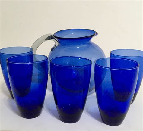 blue glass pitcher vintage